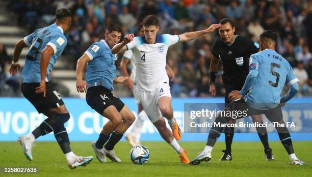 Alex Scott of England is challenged by Luciano Rodriguez , Damian Garcia and Fabricio Diaz during the FIFA U-20 World Cup Argentina 2023 Group E...