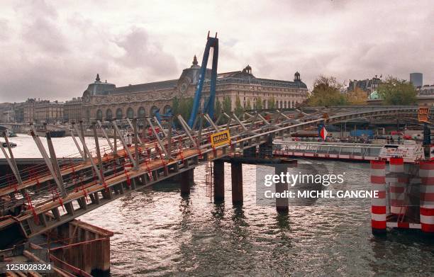 Partial view of the footbridge "Passerelle Solferino" under construction between the Tuileries Gardens and the Orsay Museum which spans over the...