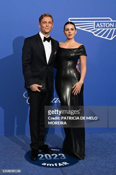 German-Costa Rican actress Ruby O. Fee and German actor Matthias Schweighofer arrive to attend the annual amfAR Cinema Against AIDS Cannes Gala at...
