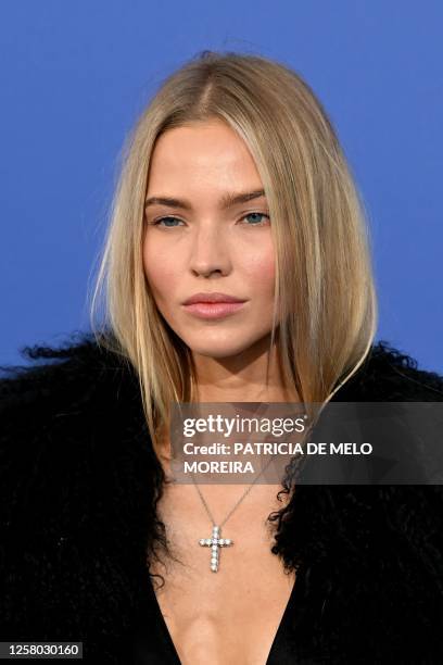 Russian model Sasha Luss arrives to attend the annual amfAR Cinema Against AIDS Cannes Gala at the Hotel du Cap-Eden-Roc in Cap d'Antibes, southern...