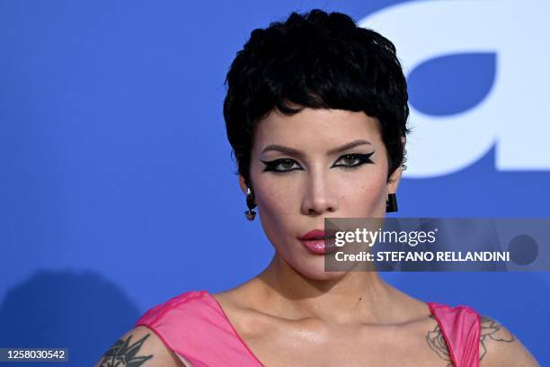 Singer Halsey arrives to attend the annual amfAR Cinema Against AIDS Cannes Gala at the Hotel du Cap-Eden-Roc in Cap d'Antibes, southern France, on...