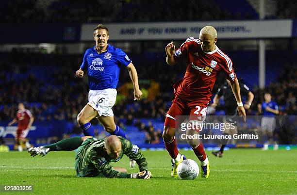 Peter Odemwingie of West Bromwich Albion is fouled in the box by Jan Mucha of Everton to give away a second half penalty during the Carling Cup Third...
