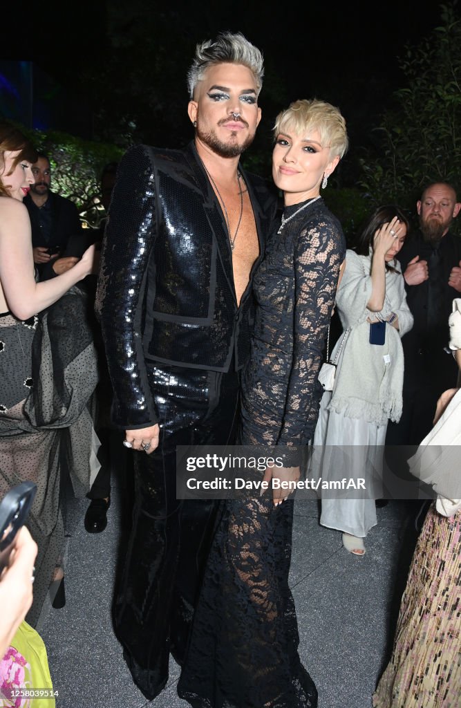 Adam Lambert and Wallis Day attend the amfAR Cannes Gala 2023 after