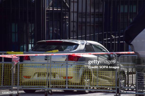 Police set up a cordon outside Downing Street after a man crashed a car into the security gates. The man was arrested and his motive for the crash...