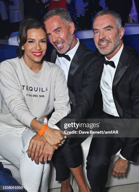 Eva Longoria, Dan Caten and Dean Caten of Dsquared attend the amfAR Cannes Gala 2023 after party at Hotel du Cap-Eden-Roc on May 25, 2023 in Cap...