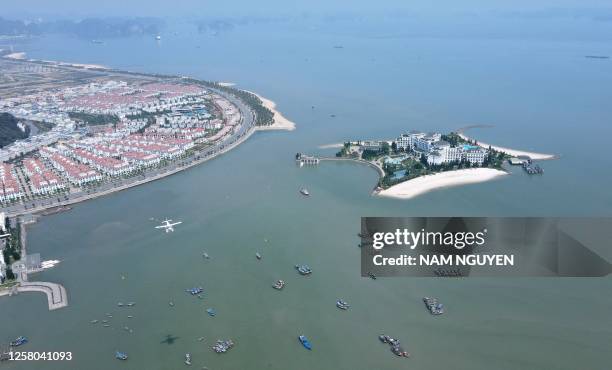 This aerial photo taken on May 17 2023, shows a built-up area of Ha Long Bay in northeast Vietnam. More than seven million visitors came to visit the...