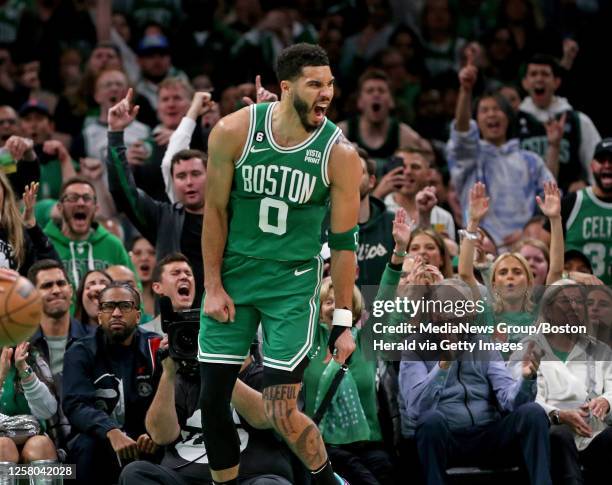 Jayson Tatum of the Boston Celtics celebrates during the first quarter of the NBA Eastern Conference Finals against the Miami Heat at the TD Garden...