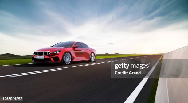 car driving on a road - carro tipo sallon imagens e fotografias de stock