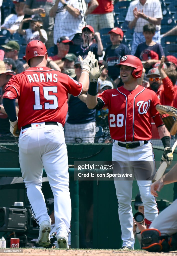 Nationals Riley Adams Washington Nationals catcher Riley Adams is congratulated by right ...