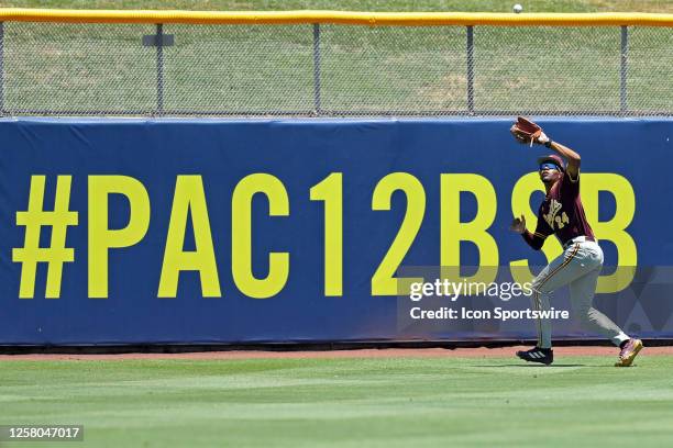 Arizona St. Outfielder Isaiah Jackson makes a catch in the outfield during a Pac-12 Baseball Tournament game between the Arizona State Sun Devils and...