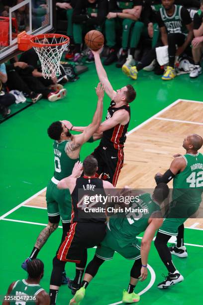 Duncan Robinson of the Miami Heat drives to the basket during the game against the Boston Celtics during the Eastern Conference Finals of the 2023...