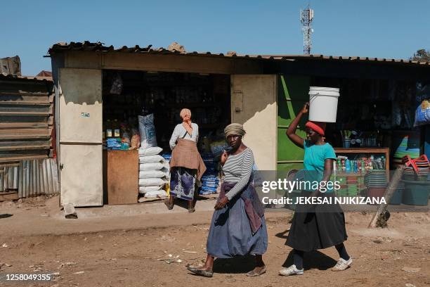 Roadside vendors sell goods at Mbare Musika in Harare on May 25, 2023. Zimbabwe's rate of inflation has shot through the roof in recent weeks as the...