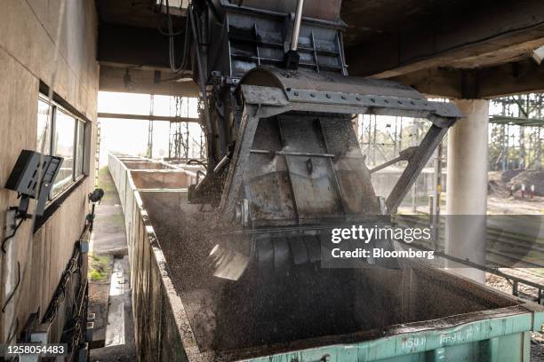 Coal fills a wagon of a freight train at the coal mine, operated by South Eastern Coalfields Ltd., in Gevra, Chhattisgarh, India, on Wednesday, May...