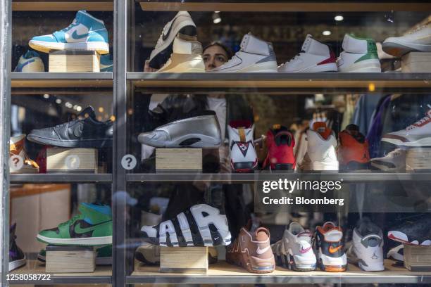 Shopper browses Nike Inc. Trainers inside a shoe store on Carnaby Street in London, UK, on Thursday, May 25, 2023. UK retailers saw sales jump more...