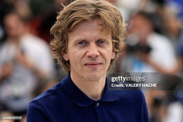French actor and director Alex Lutz poses during a photocall for the film "Une Nuit" during the 76th edition of the Cannes Film Festival in Cannes,...