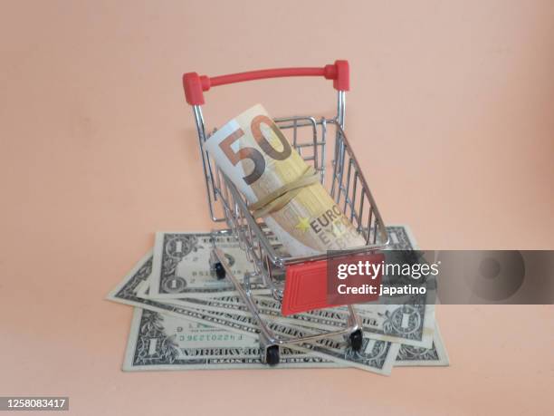 devaluation of the dollar - inflation euro stockfoto's en -beelden