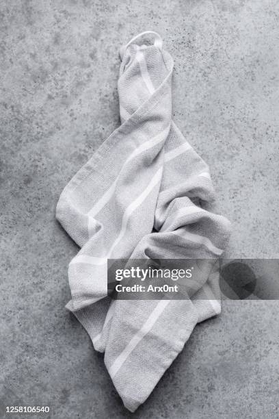 linen kitchen textile on grey concrete background - grey slate stock-fotos und bilder
