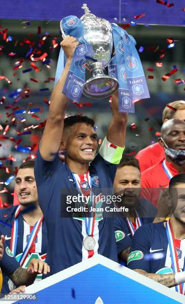 Captain Thiago Silva, Neymar Jr of PSG and teammates celebrate the victory during the trophy ceremony following the French Cup Final match between...
