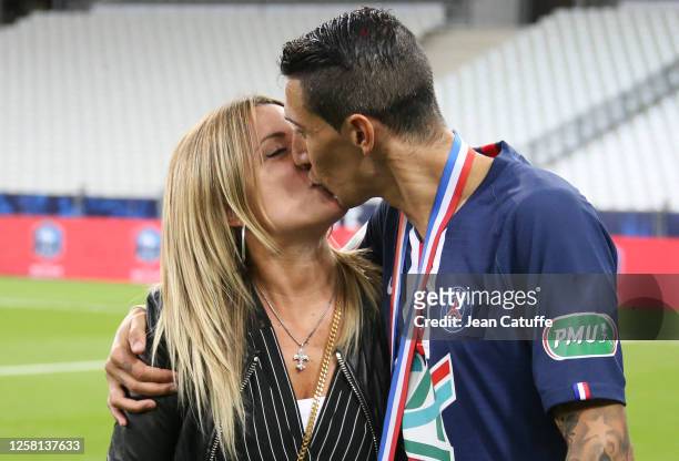 Angel Di Maria of PSG kissing his wife Jorgelina Cardoso to celebrate the victory following the French Cup Final match between Paris Saint Germain...