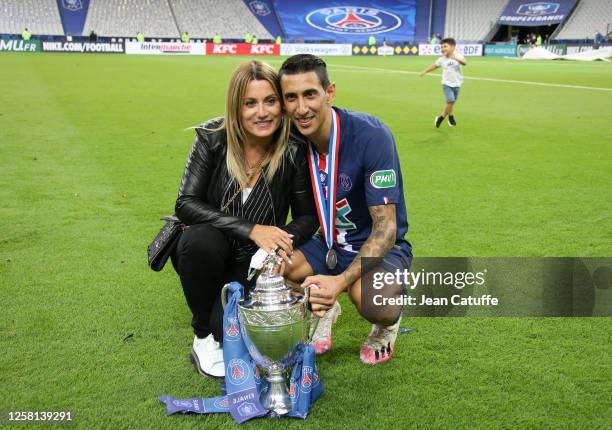 Angel Di Maria of PSG and his wife Jorgelina Cardoso celebrate the victory following the French Cup Final match between Paris Saint Germain and AS...