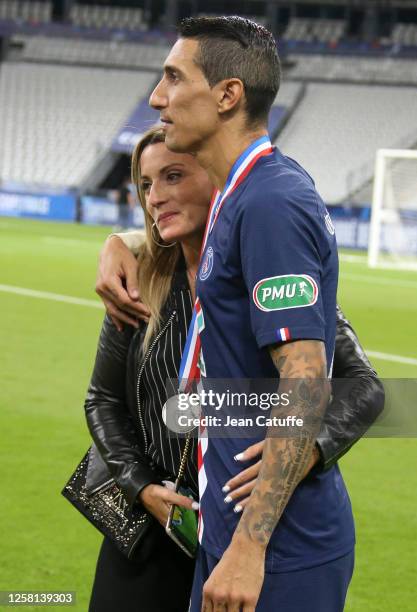 Angel Di Maria of PSG and his wife Jorgelina Cardoso celebrate the victory following the French Cup Final match between Paris Saint Germain and AS...