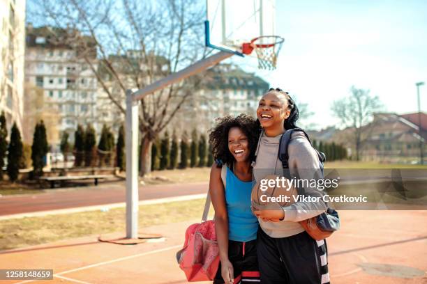 basketball fair play after game - women's basketball stock pictures, royalty-free photos & images