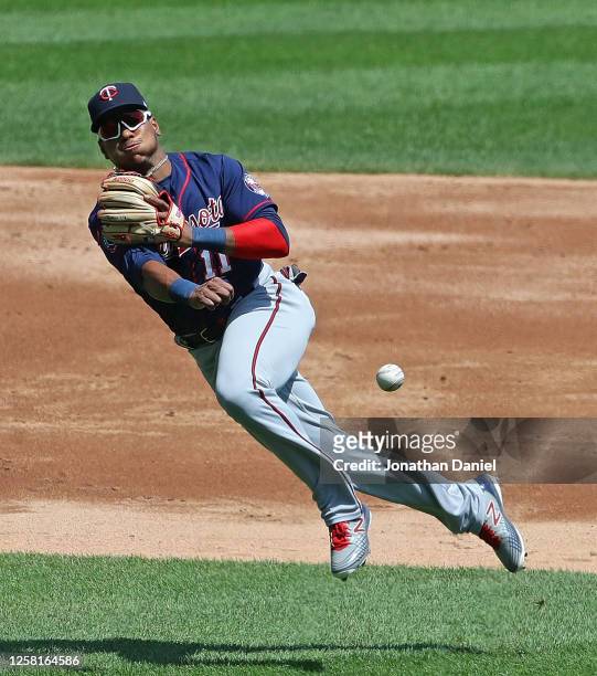 Jorge Polanco of the Minnesota Twins throws out Luis Robert of the Chicago White Sox in the 2nd inning at Guaranteed Rate Field on July 25, 2020 in...