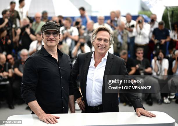 Director Robert Rodriguez and US actor William Fichtner pose during a photocall for the film "Hypnotic" at the 76th edition of the Cannes Film...