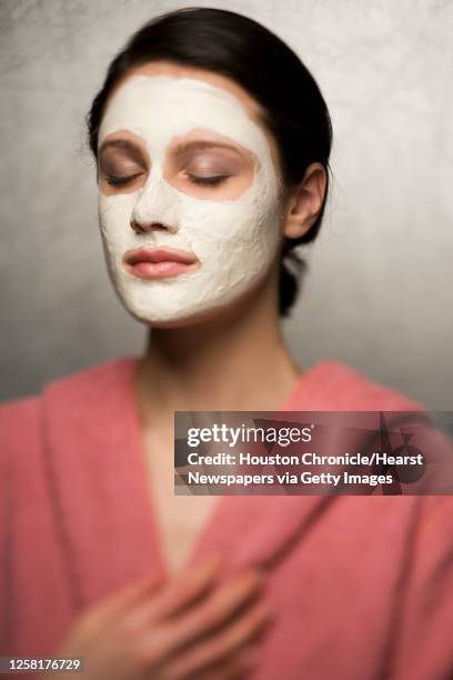 Model Brisa Jimenez of the Neal Hamil agency shown with her face covered by an Alba Organics Deep Sea Facial Mask photographed in the Chronicle...