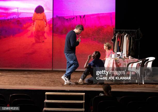 Director Milo Rau speaks to Belgian actors Sara De Bosschere and Arne De Tremerie during the rehearsal of his latest project "Antigone in the Amazon"...