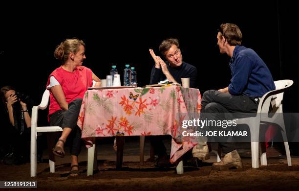 Director Milo Rau speaks to Belgian actors Sara De Bosschere and Arne De Tremerie during the rehearsal of his latest project "Antigone in the Amazon"...