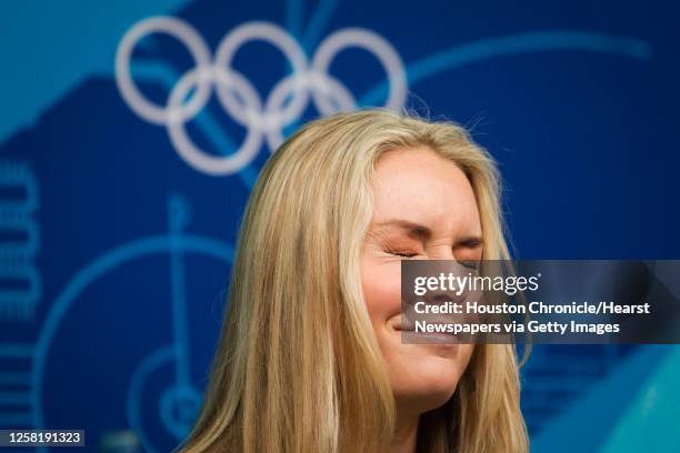 Alpine skier Lindsey Vonn reacts to a question about her apperance in the Sports Illustrated swimsuit issue during a press conference in advance of...