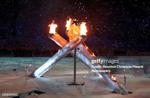 The Olympic flame is lit during opening ceremonies for the 2010 Winter Olympic Games at the BC Place Stadium on Friday, Feb. 12 in Vancouver.