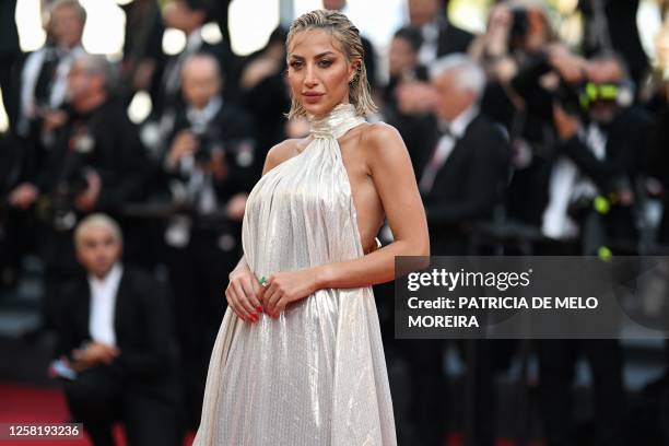 Saudi model Roz arrives for the screening of the film "The Old Oak" during the 76th edition of the Cannes Film Festival in Cannes, southern France,...
