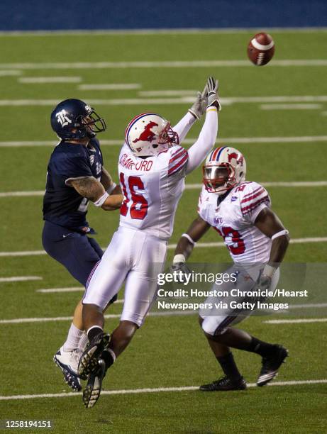 Southern Methodist Mustangs cornerback Richard Crawford intercepts a pass intended for Rice Owls running back Sam McGuffie during the second half in...