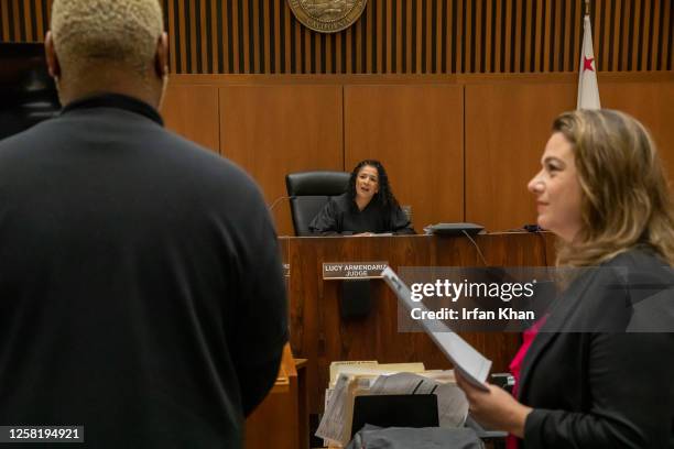 The defendant appears before Judge Maria Lucy Armendariz with his public defender, Caroline Goodson, right, in Dept. 48, Clara Shortridge Foltz...