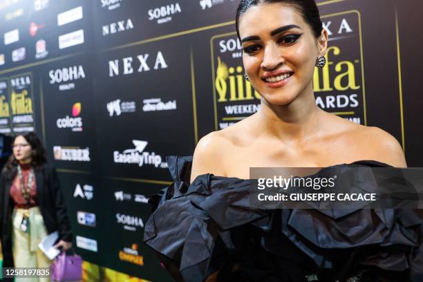 Bollywood actress Kriti Sanon arrives for the IIFA Rocks event of the 23rd edition of the International Indian Film Academy Awards in Abu Dhabi on...