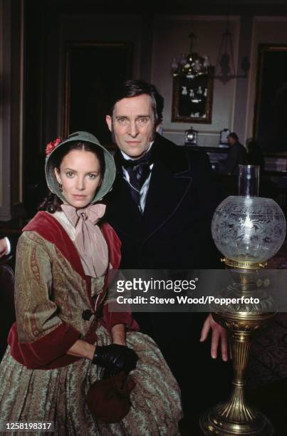 Actors Jaclyn Smith and Jeremy Brett posing together during the filming of the TV movie "Florence Nightingale" , at the Pinewood Studios in Iver...