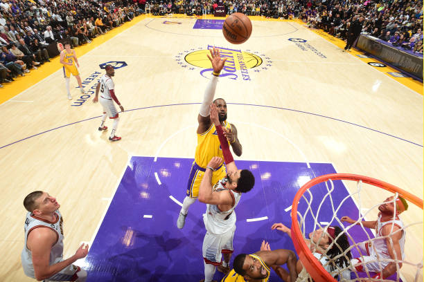 LeBron James of the Los Angeles Lakers shoots the ball during the game against the Denver Nuggets during Round 3 Game 4 of the Western Conference...
