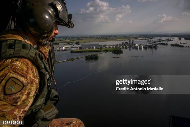 In this aerial picture, officers of the 7th Italian Army Aviation Regiment "Vega" aboard an NH-90 helicopter carry out a reconnaissance of the...