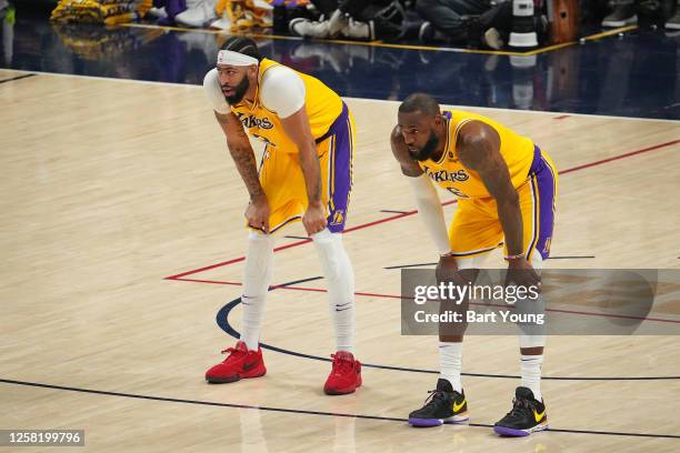 Anthony Davis and LeBron James of the Los Angeles Lakers look on during Game 2 of the 2023 NBA Playoffs Western Conference Finals against the Denver...