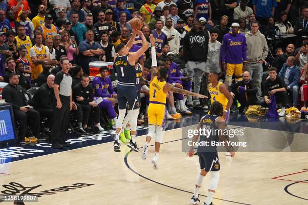 Michael Porter Jr. #1 of the Denver Nuggets shoots a three point basket during Game 2 of the 2023 NBA Playoffs Western Conference Finals against the...