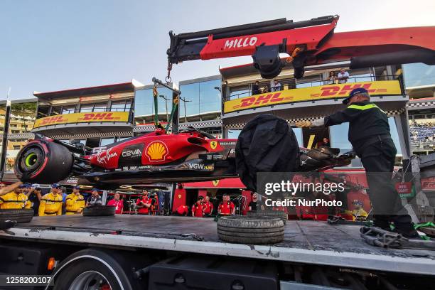 Car of Carlos Sainz of Ferrari is being transported to Ferrari garage after being crashed in Practice 2 ahead of the F1 Grand Prix of Monaco at...