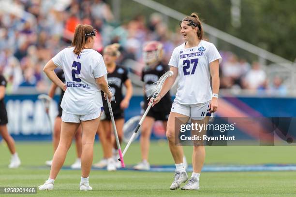 Erin Coykendall and Izzy Scane of the Northwestern Wildcats react after a goal scored against the Denver Pioneers in the second half during the...