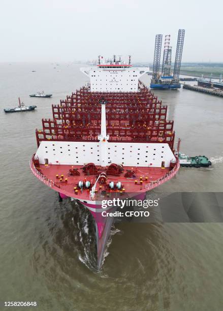 The 366-meter-long ONE FRUITION container ship leaves the dock after delivery in Suzhou, Jiangsu province, China, May 26, 2023. This is the third...