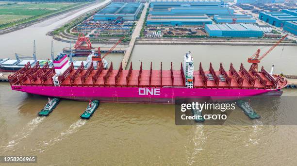 The 366-meter-long ONE FRUITION container ship leaves the dock after delivery in Suzhou, Jiangsu province, China, May 26, 2023. This is the third...