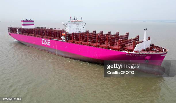 The 366-meter-long ONE FRUITION container ship leaves the dock after delivery in Suzhou, Jiangsu province, China, May 26, 2023. This is the third...