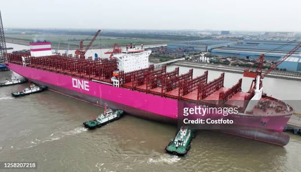 The 366-meter-long ONE FRUITION container ship leaves the dock after delivery in Suzhou, Jiangsu province, China, May 26, 2023. This is the third...