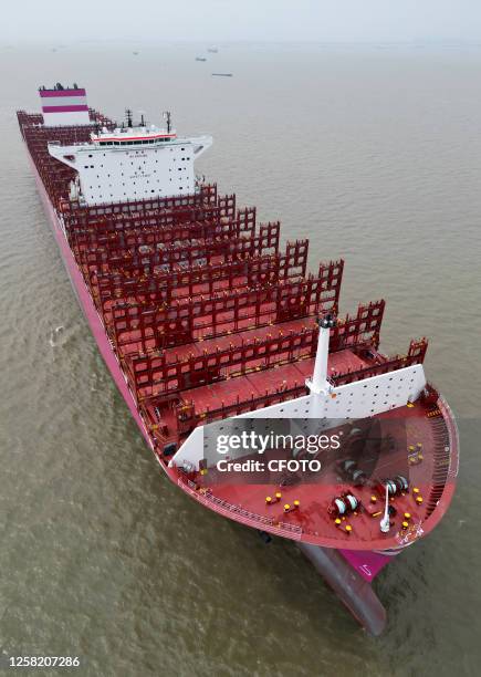 The 366-meter-long ONE FRUITION container ship leaves the dock after delivery in Suzhou, Jiangsu province, China, May 26, 2023. This is the third...