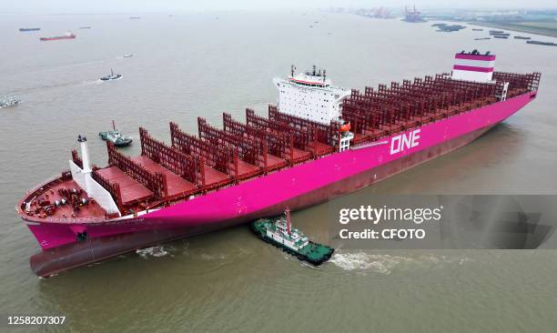 The 366-meter-long ONE FRUITION container ship leaves the dock after delivery in Suzhou, Jiangsu province, China, May 26, 2023. This is the third...